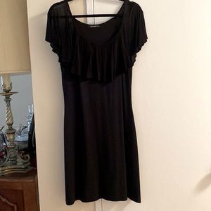 Rayon & Spandex Sleeveless Dress. Feels like jersey.Easy to wear